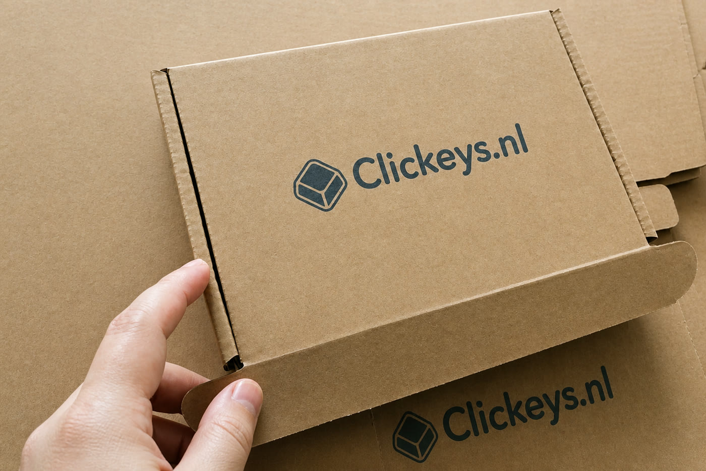 Clickeys.nl logo printed on a kraft mailer for a client order